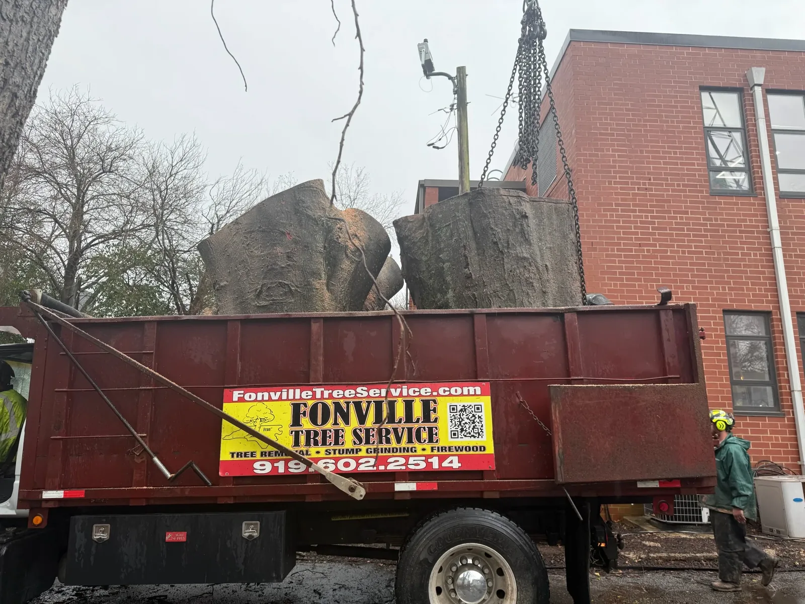 Fonville dump truck loaded with logs for haul-off